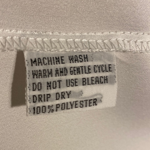 White eyelet collar/front, short sleeves, gathered back, 100% polyester. - Picture 8 of 8